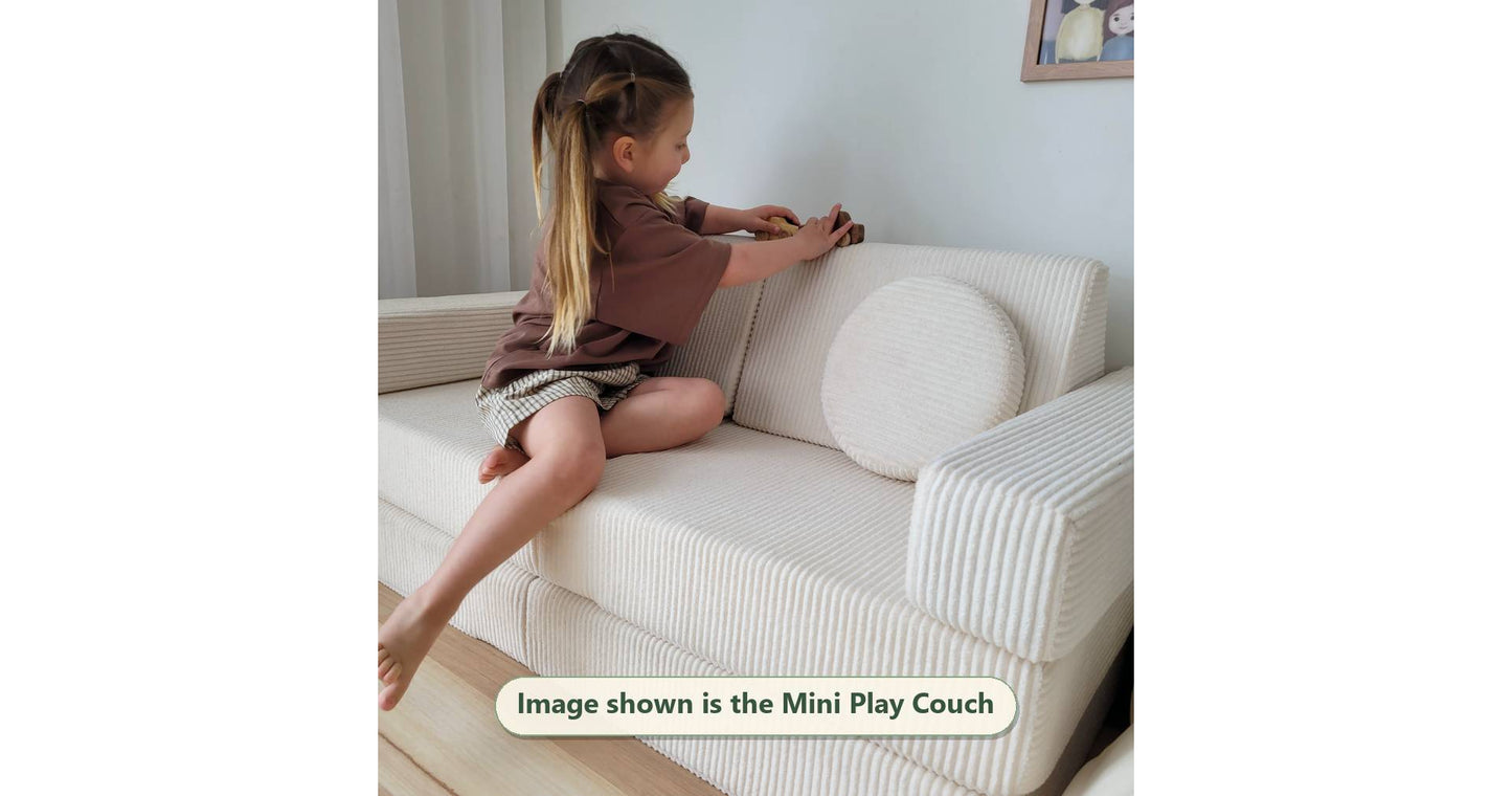 Snow white Funsquare Mini Play Couch with child sitting cross-legged playing with toys
