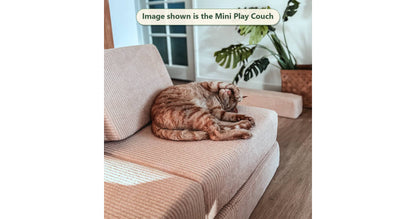 Blush pink Funsquare Mini Play Couch with ginger cat resting on the seat