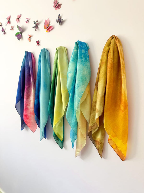 Funsquare Fun Scarf play silks hanging on a wall