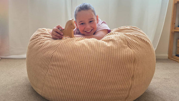 Child lying on a biscuit corduroy Funsquare Cloud Pod